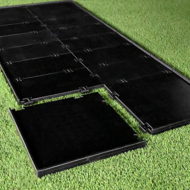 Carl's HotShot Golf Mat No-Slip Base, modular rubber pieces on turf