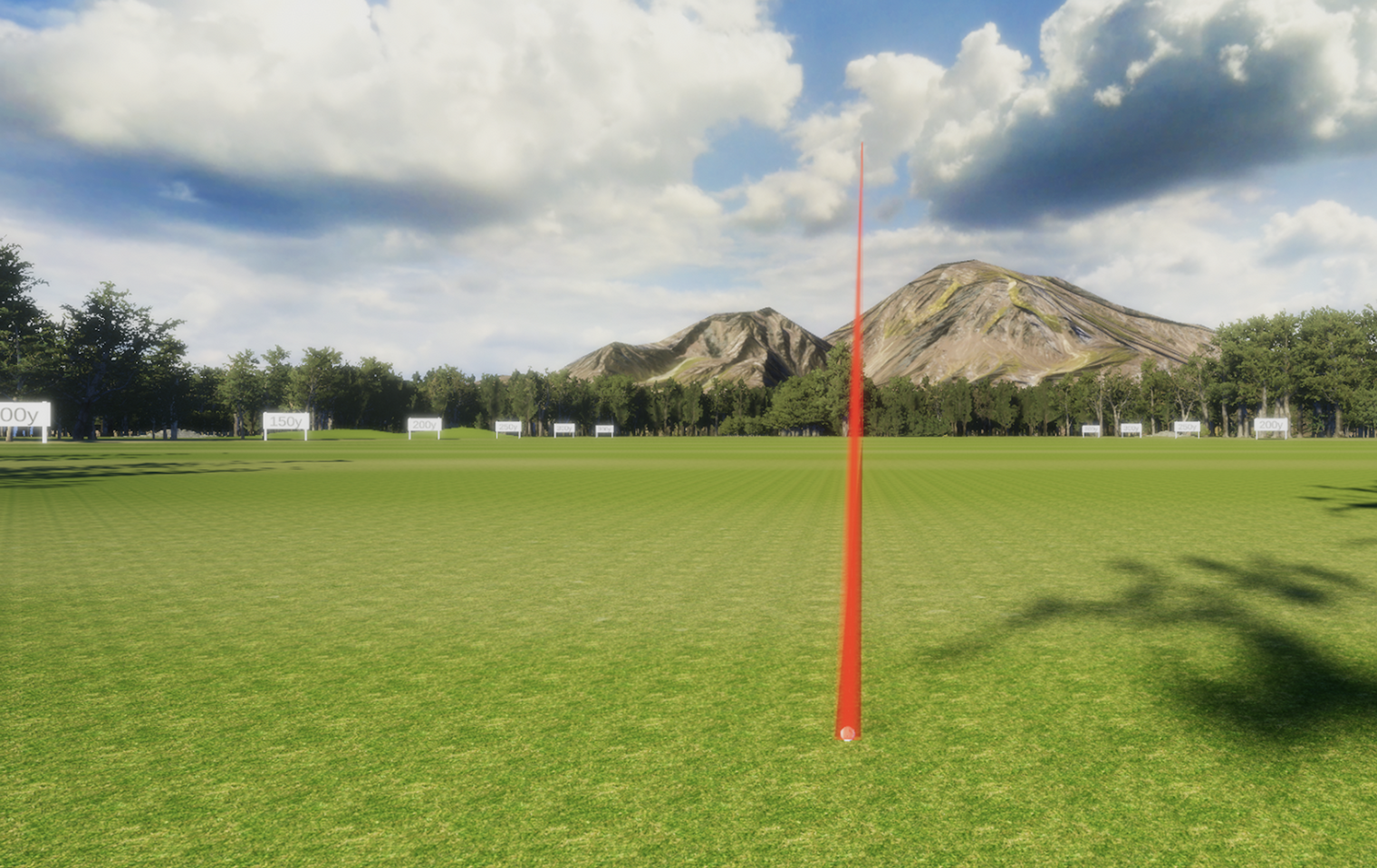 VTrack Overhead Golf Launch Monitor displaying a clear golf range under a blue sky with mountains in the background.