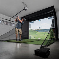 Carl's Place DIY enclosure installed in a garage golf bay