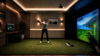 Ceiling-mounted Optoma projector in a home golf simulator room (lifestyle image)