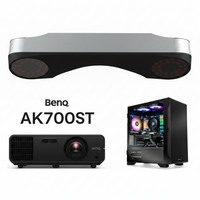 BenQ AK700ST projector bundle shown on a white background, including the silver and black projector head, the projector itself, and a black PC tower with illuminated RGB fans.