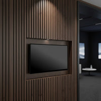 27 inch FHD 24/7 touch monitor wall mounted in a recessed wood slat feature wall